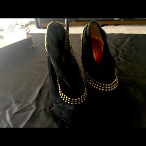 Black suede booties with brush bronze